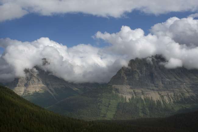 High peaks enclosed in clouds, Waterton Glacier International Peace Park, USA - Canada