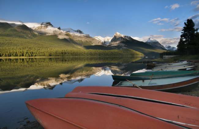 Boats parked on the lakeshore of Maligne Lake, Jasper National Park, Jasper Canada