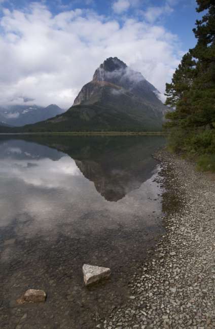 Mountain peak across Swiftwater lake, Waterton Glacier International Peace Park, USA - Canada