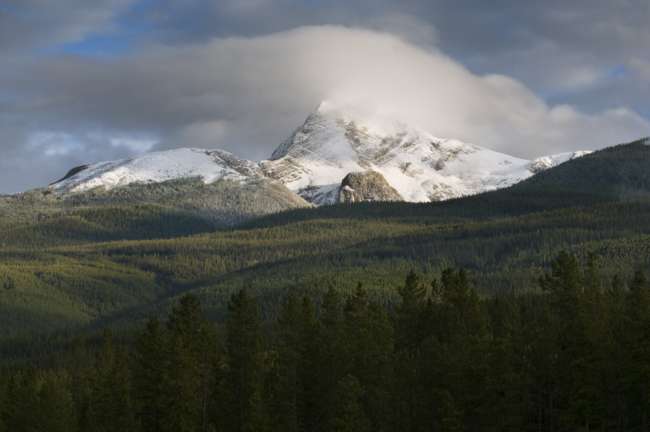 Mountain Peaks in fog along the Canadian Rockies, Banff National Park, Banff, Canada
