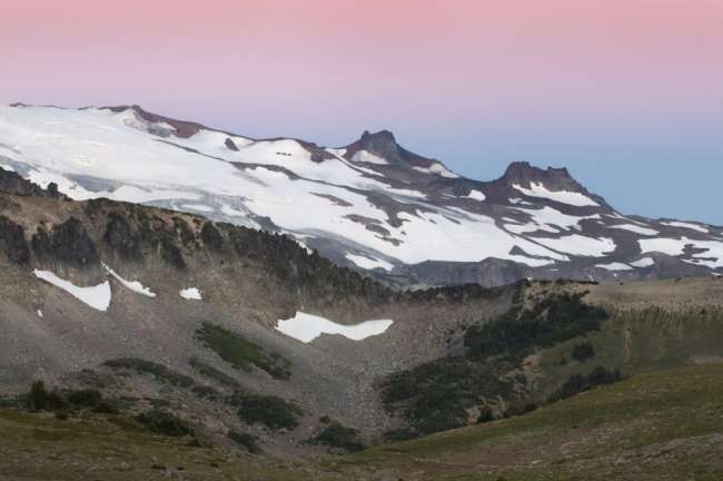 Alpine glow around the peak of Mount Rainier National Park, Washington, USA