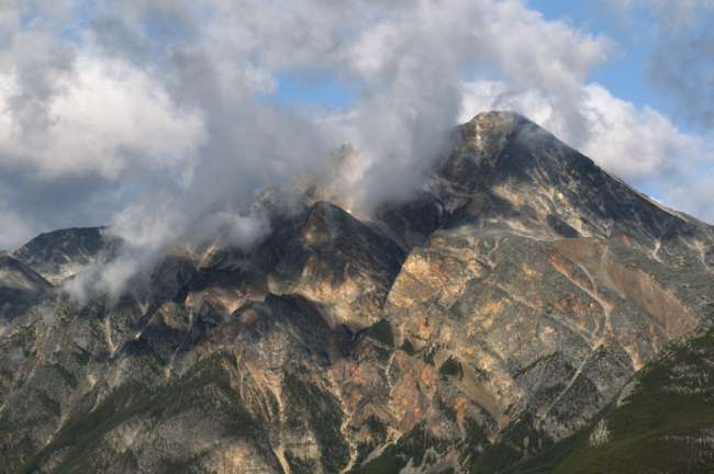Mountain and fog in the early morning along Maligne Canyon Road, Jasper National Park, Jasper, Canada