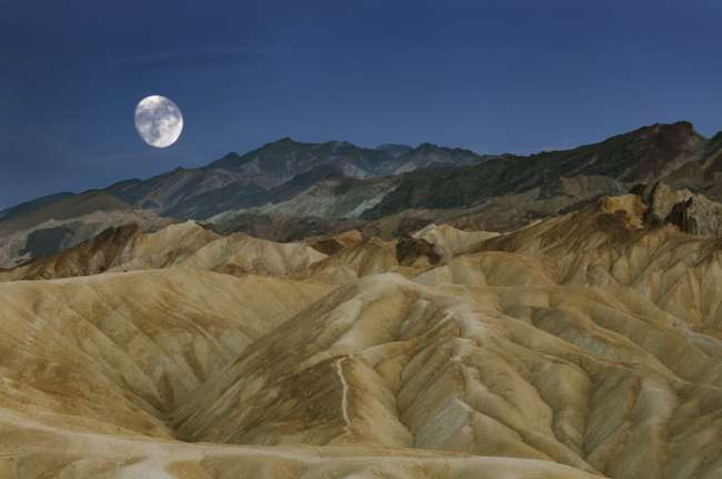 Moonrise over Zabriskie Point, Death Valley National Park, California, USA