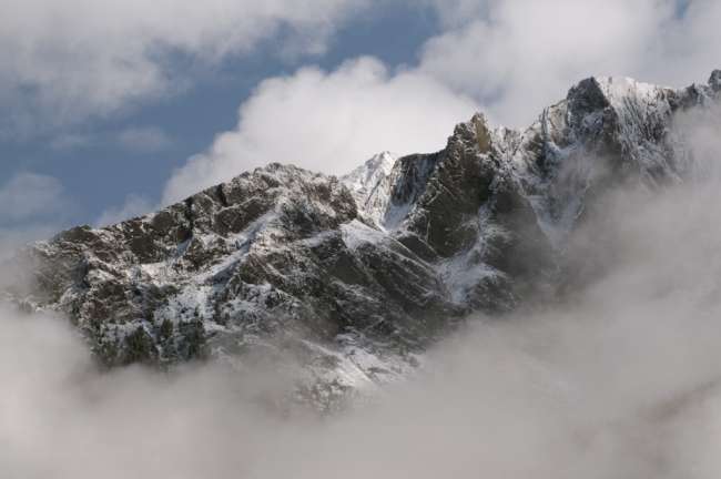 Mountain peaks enclosed in cloads in Jasper National Park, Jasper Canada