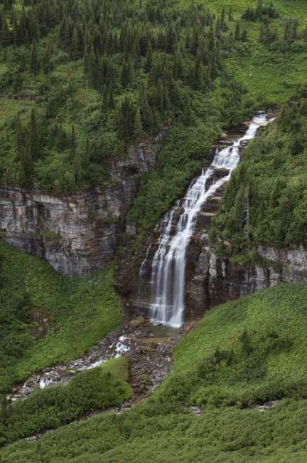 Waterfall in a valley, Waterton Glacier International Peace Park, USA - Canada
