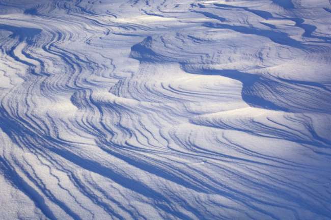 Snow drift patterns at sunrise near Little Martin Island, Lake Kabetogama, Voyageurs National Park, Minnesota, USA