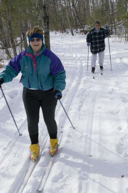Cross Country skiers, Black Bay ski trail, Rainy Lake, Voyageurs National Park, Minnesota, USA