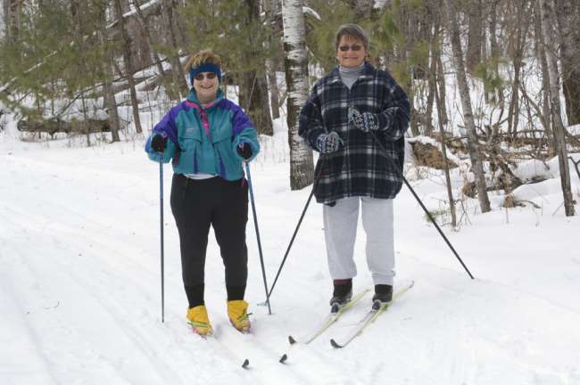Cross Country skiers, Black Bay ski trail, Rainy Lake, Voyageurs National Park, Minnesota, USA
