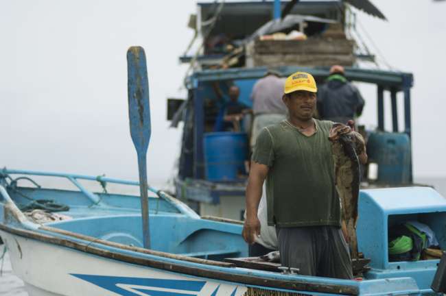 Fisherman at sea, Galapagos National Park, Ecuador