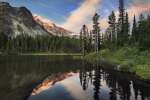 Mineral Mountain and Mount Rainier reflected in Mystic Lake, Mount Rainier National Park, Washington, USA