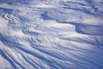 Snow drift patterns at sunrise near Little Martin Island, Lake Kabetogama, Voyageurs National Park, Minnesota, USA